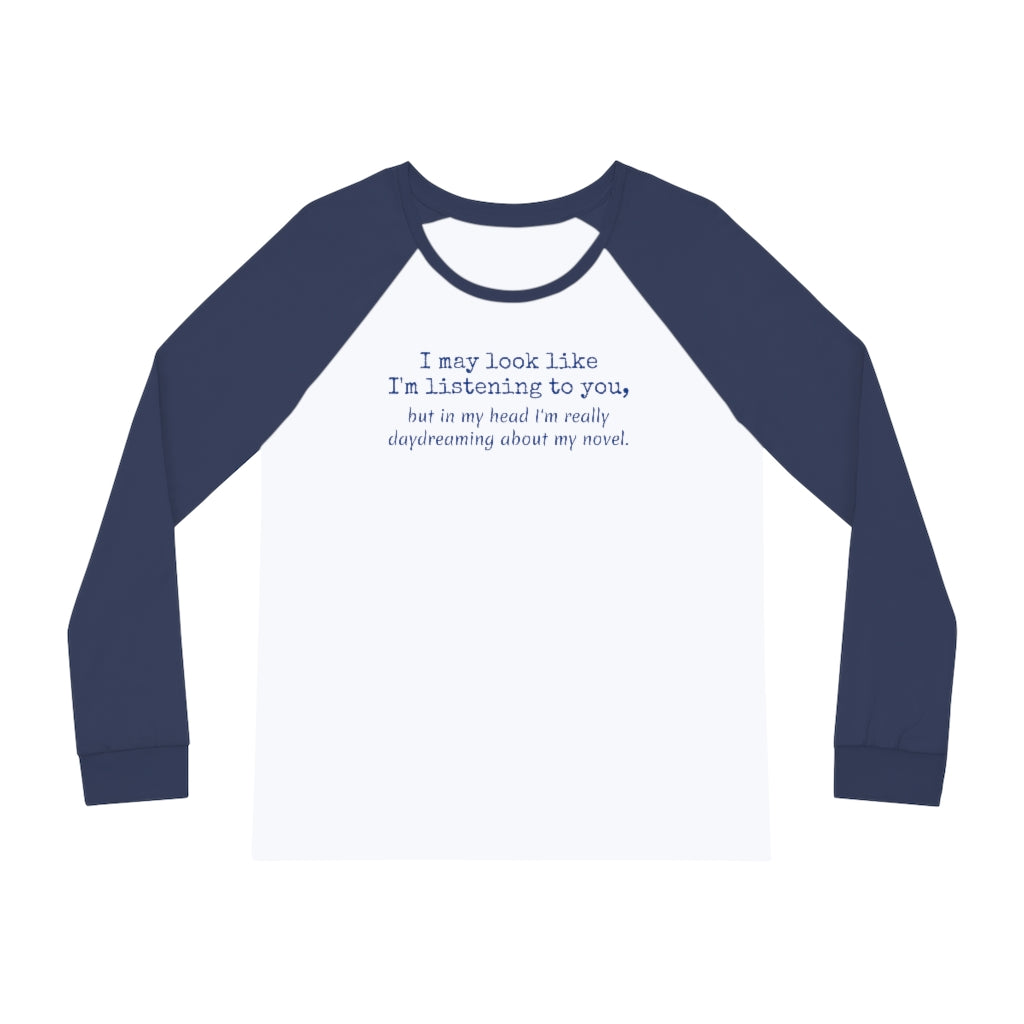 Blue and white raglan pajamas with the "I may look like I'm listening to you, but..." humorous phrase about pretending to listen while daydreaming about writing a novel, perfect for every book lover.