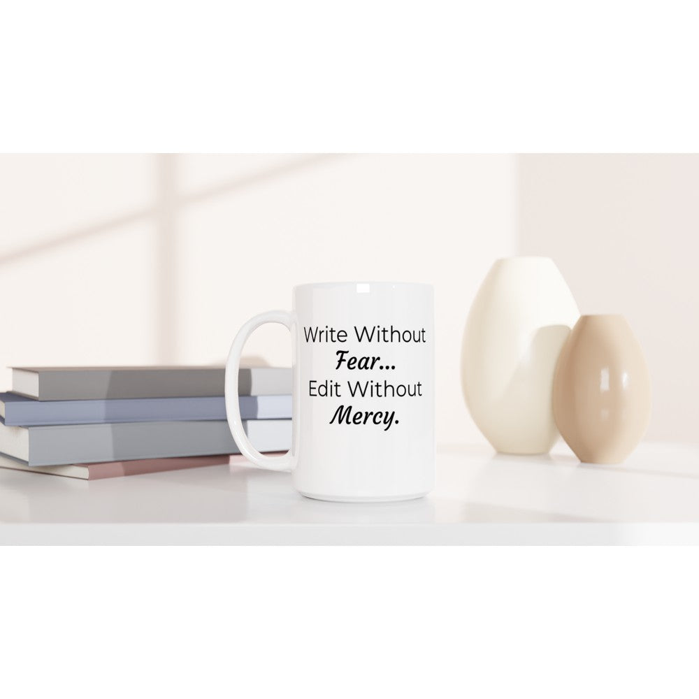 A white ceramic mug with the creative process depicted through the words "Write Without Fear... Edit Without Mercy.